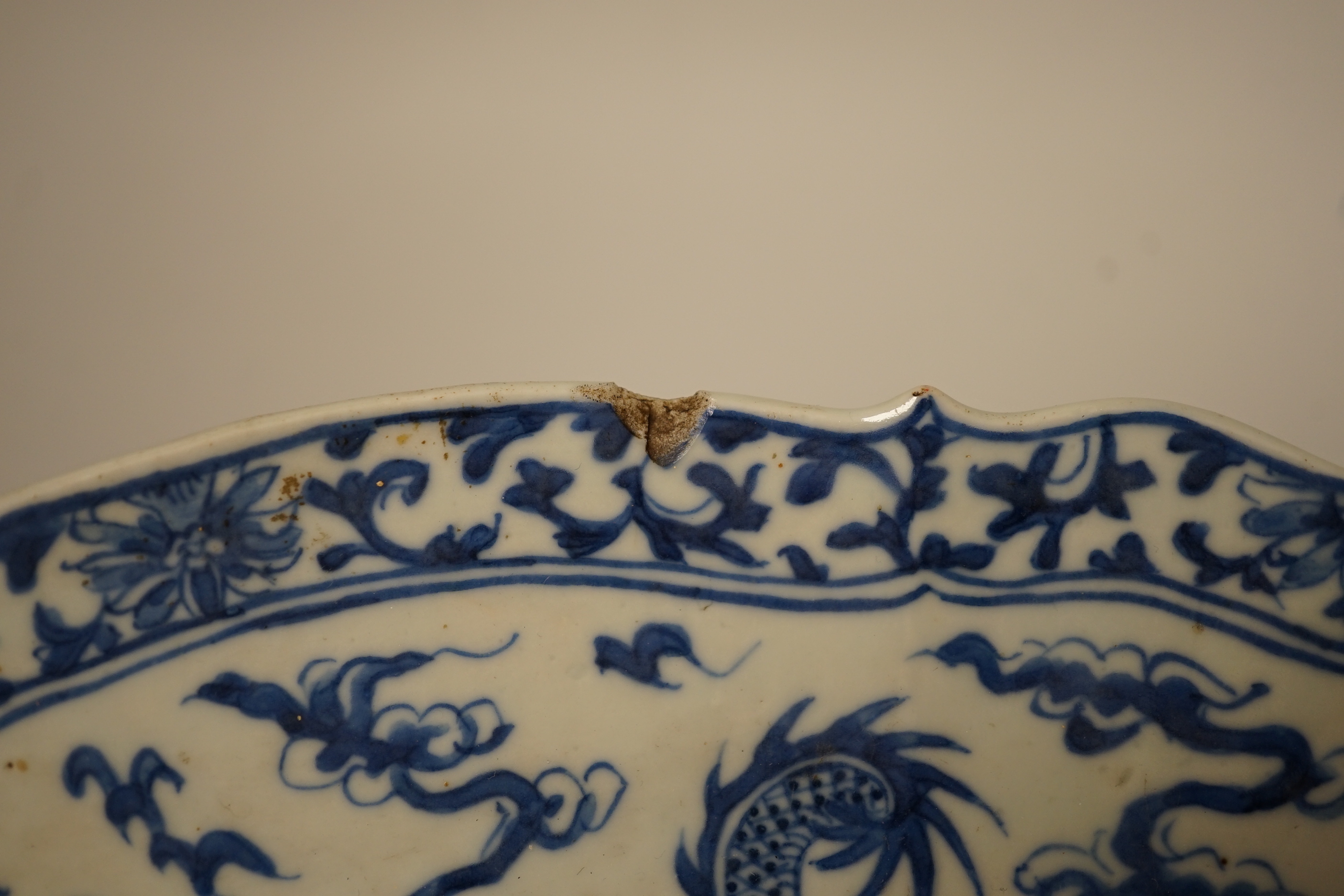A 19th century Chinese blue and white ‘dragon’ lozenge shaped dish, 39cm